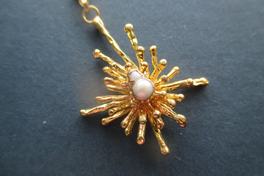 Gold plated pearl star pendant
