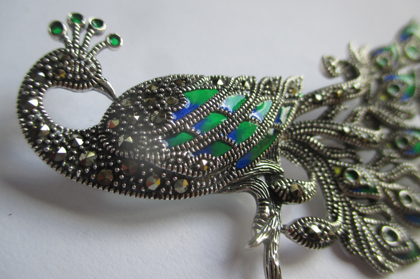 Peacock broach