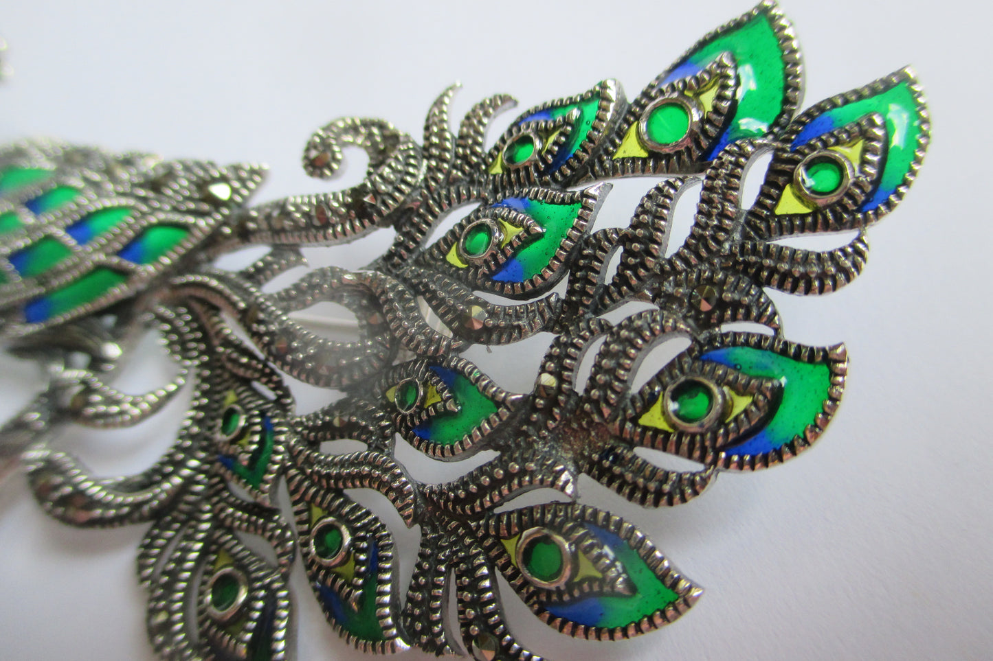 Peacock broach