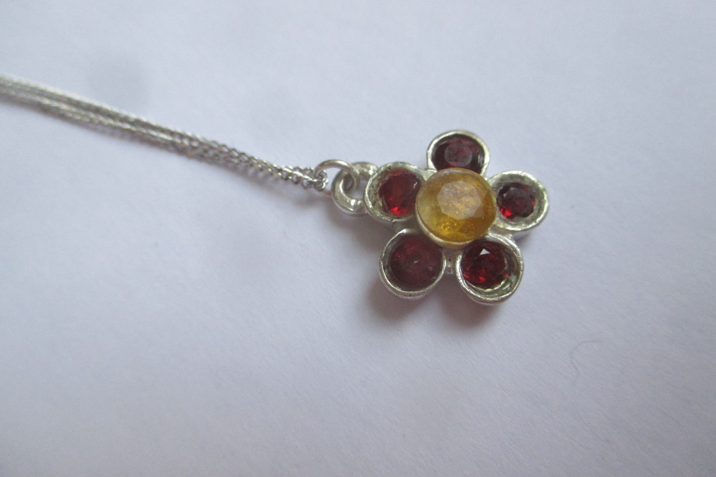 Silver flower pendant