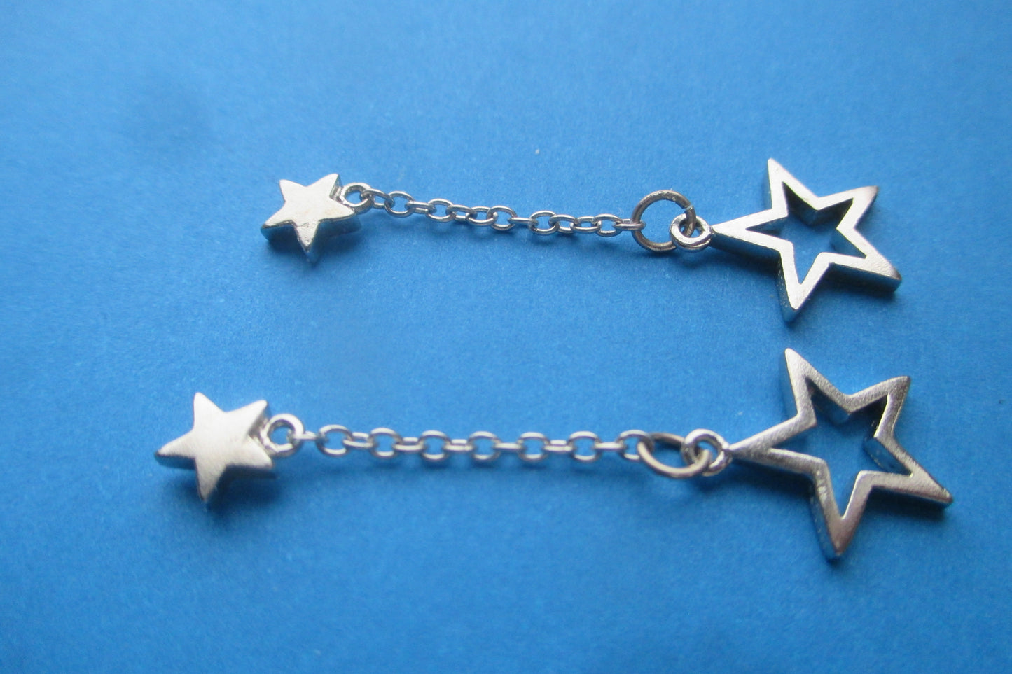 Silver star stud earrings