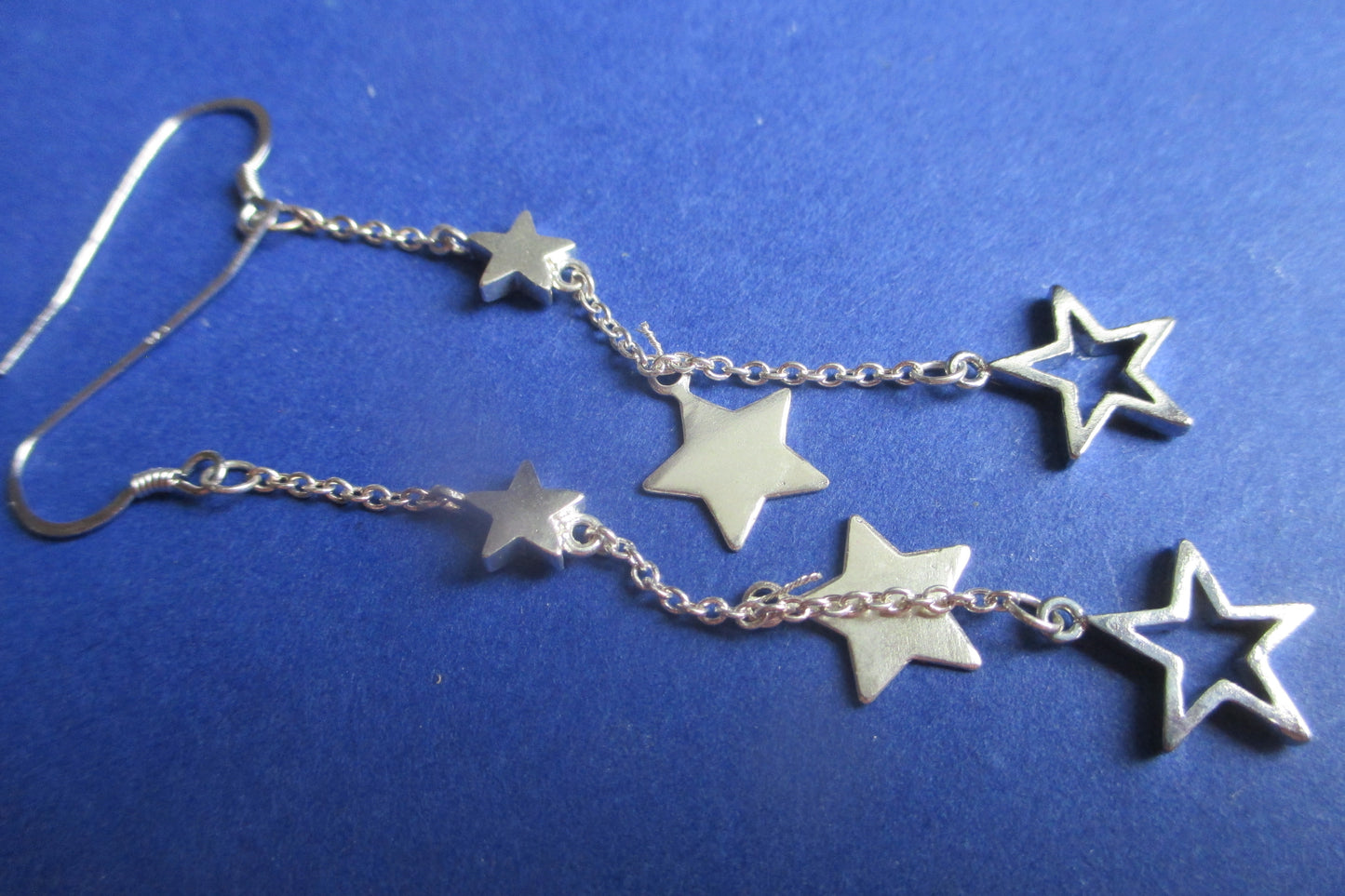 Silver stars hooks earrings