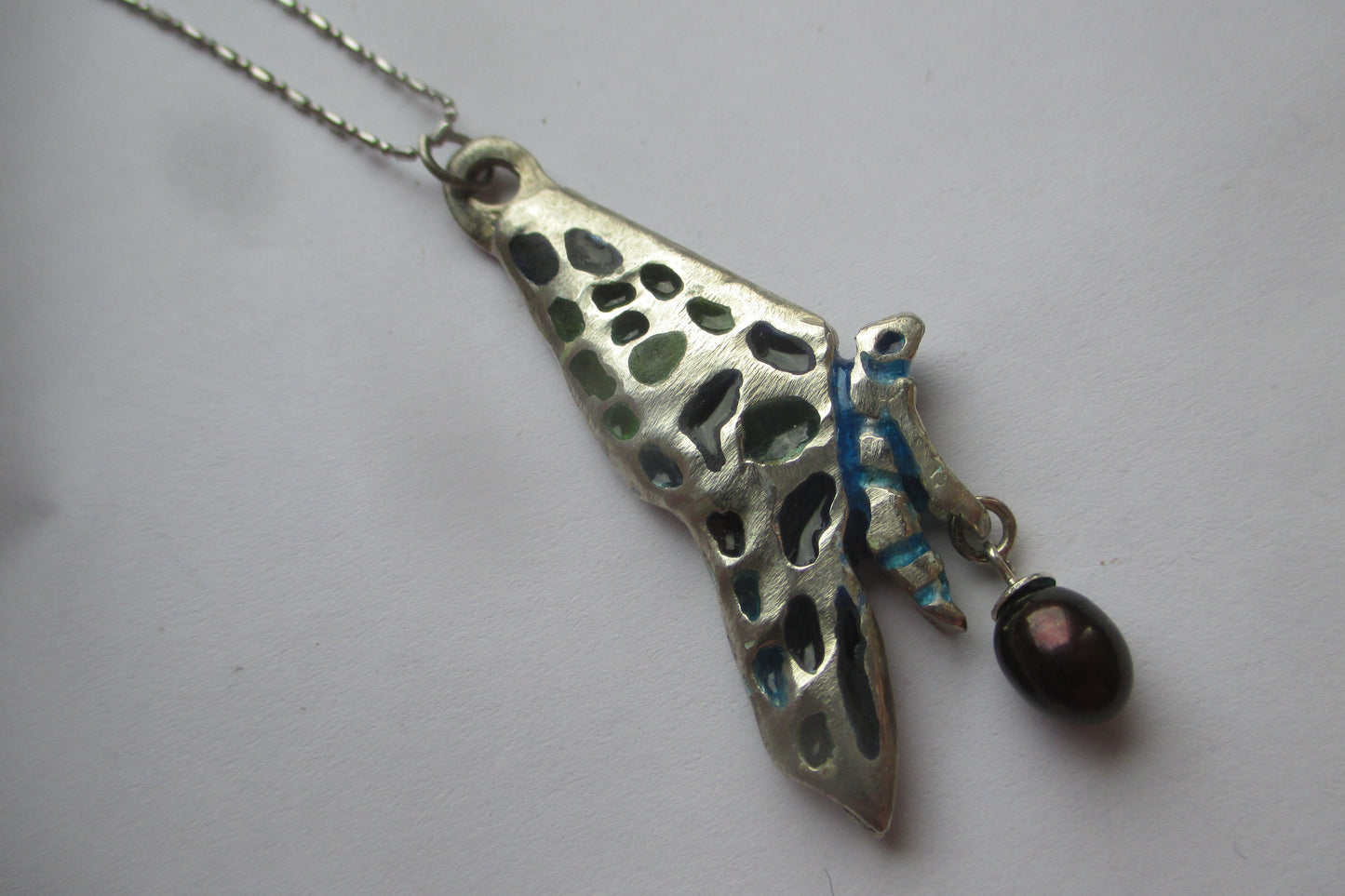 Silver Butterfly pendant with black pearl