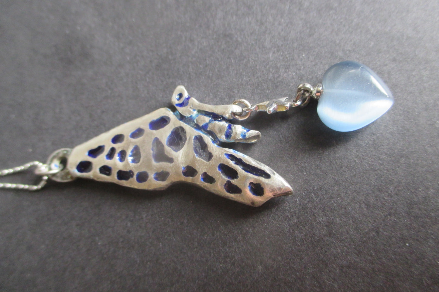 Silver Butterfly pendant with Venetian glass heart