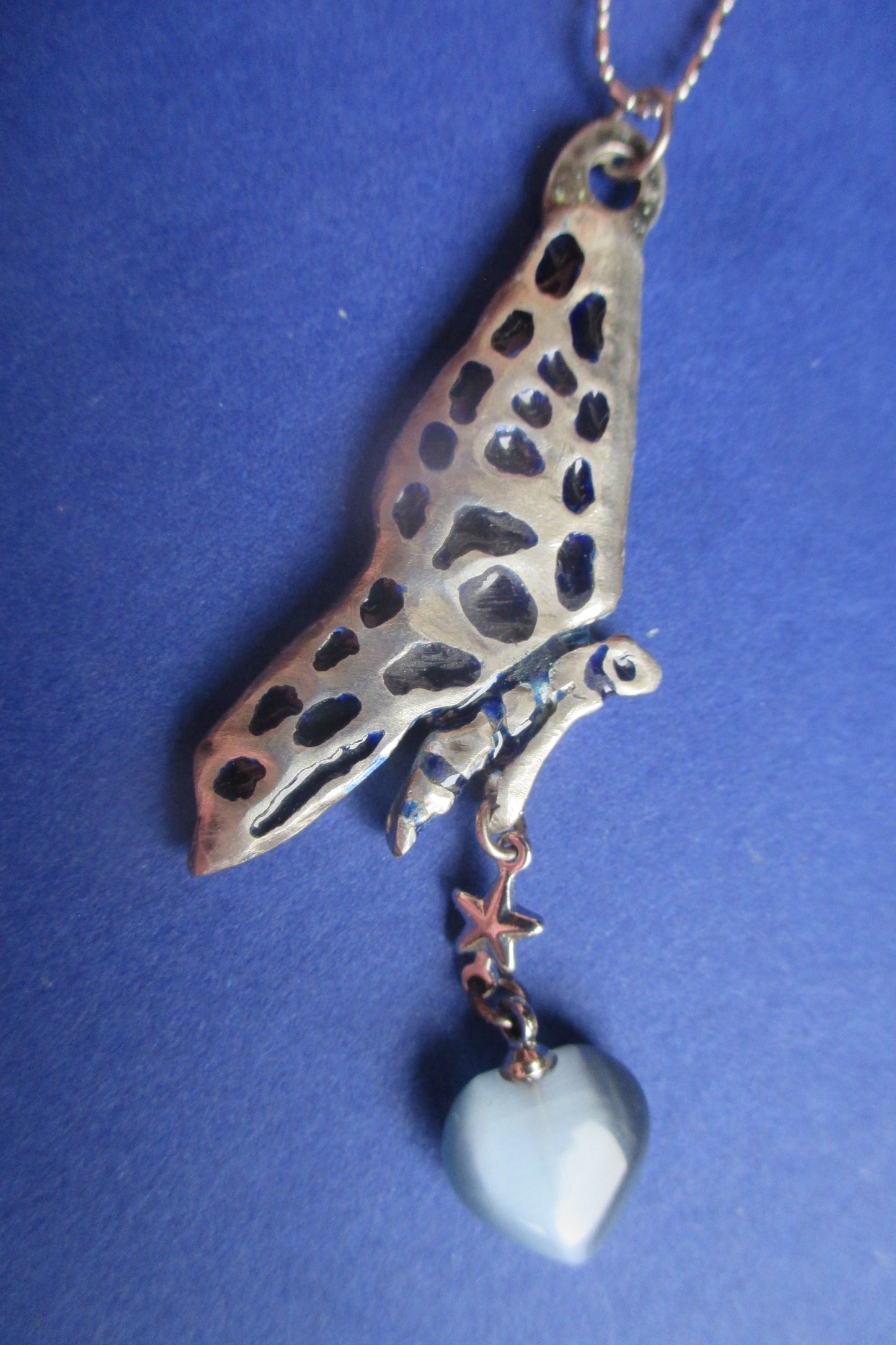 Silver Butterfly pendant with Venetian glass heart