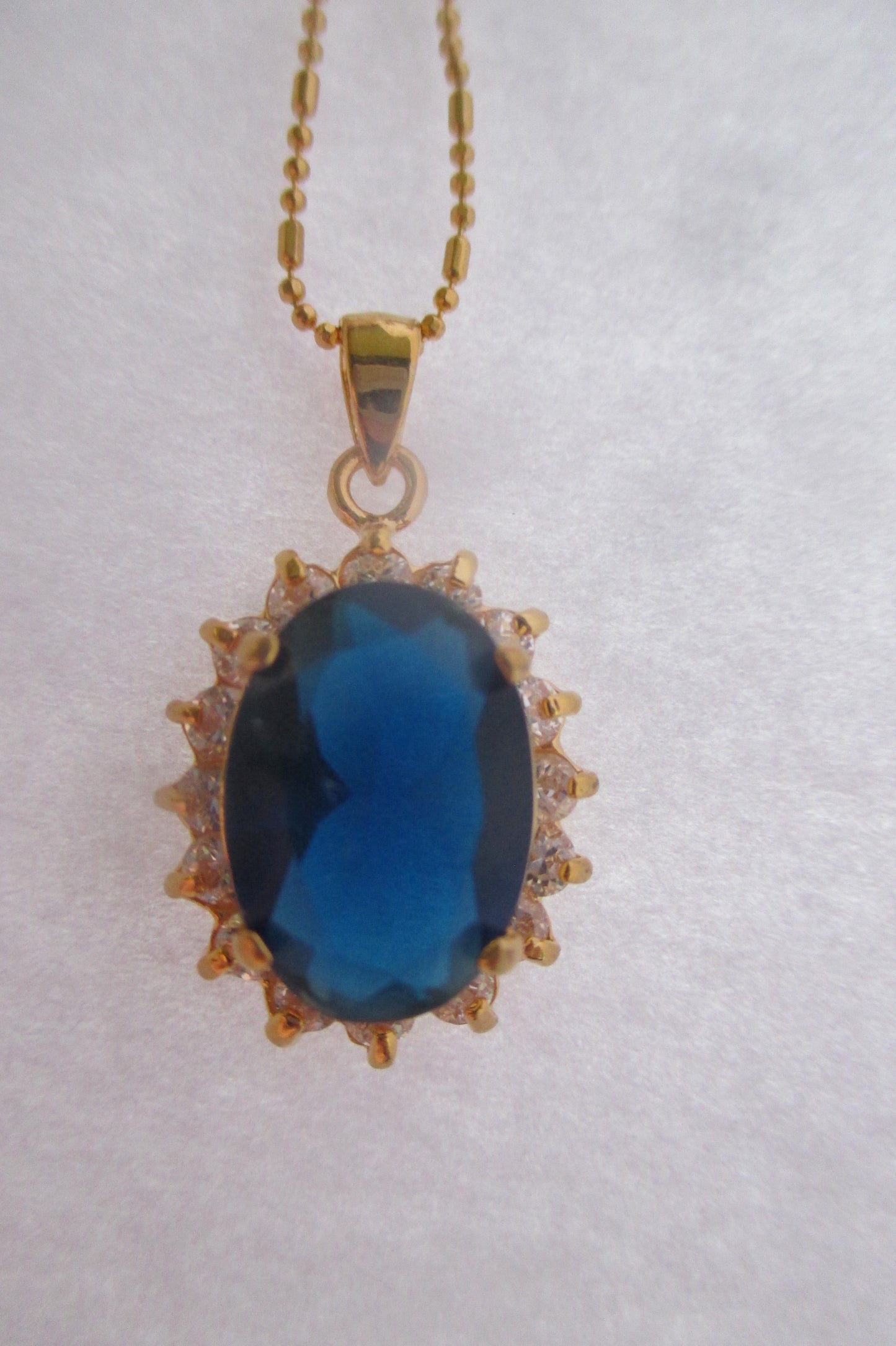 Faux sapphire pendant