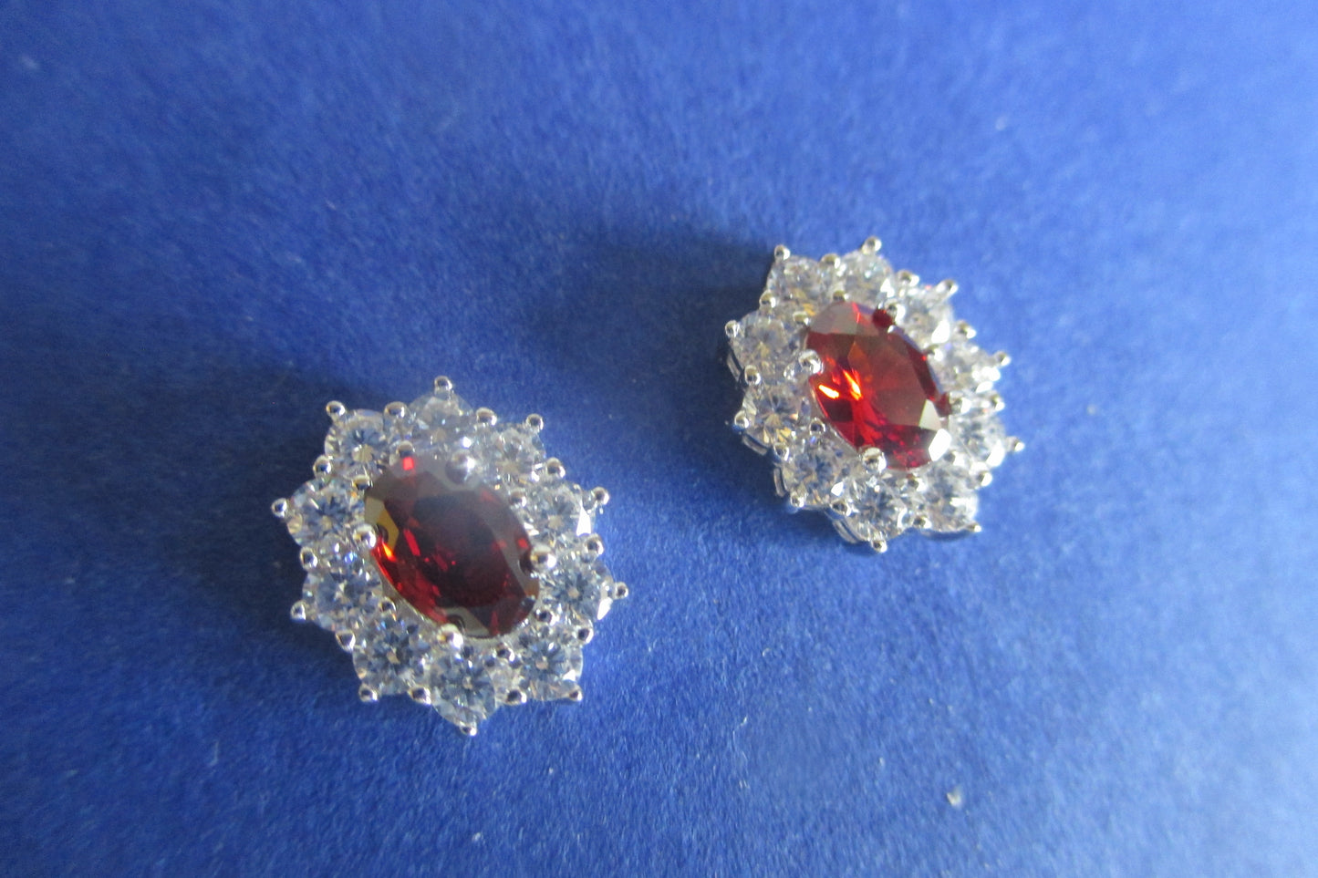 Silver garnet accent stud earrings