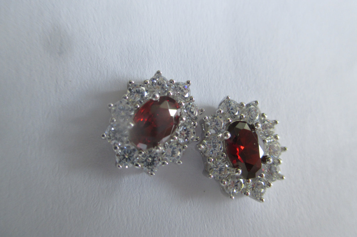 Silver garnet accent stud earrings