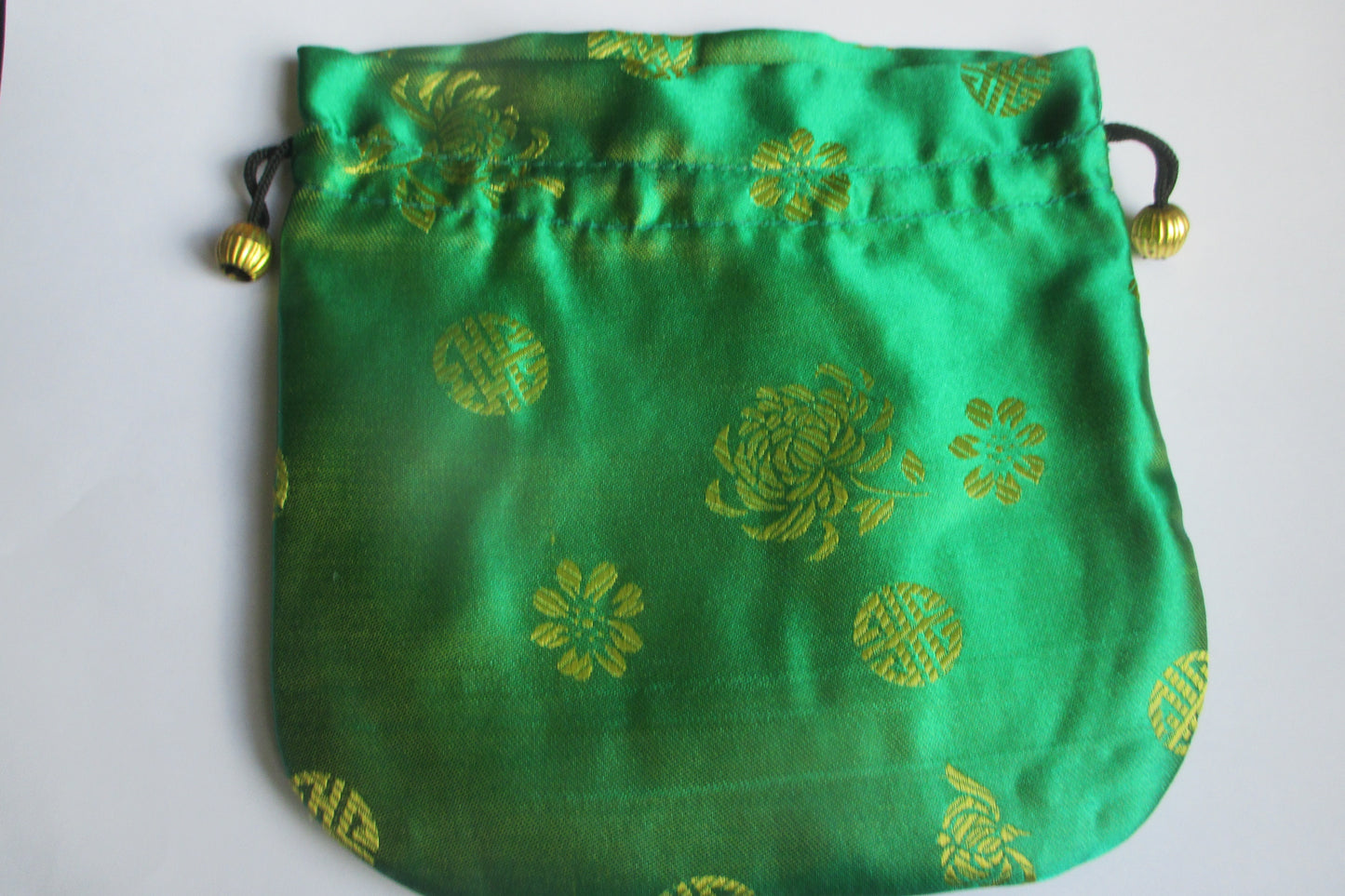 Light green silk jewel bag