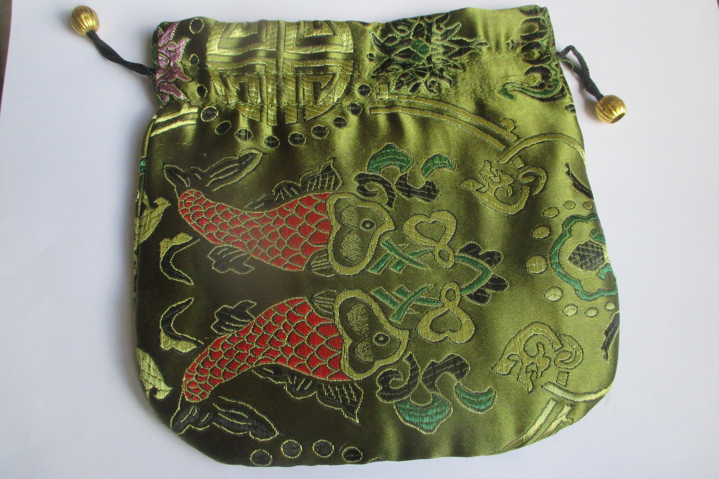 Dark green silk jewel bag