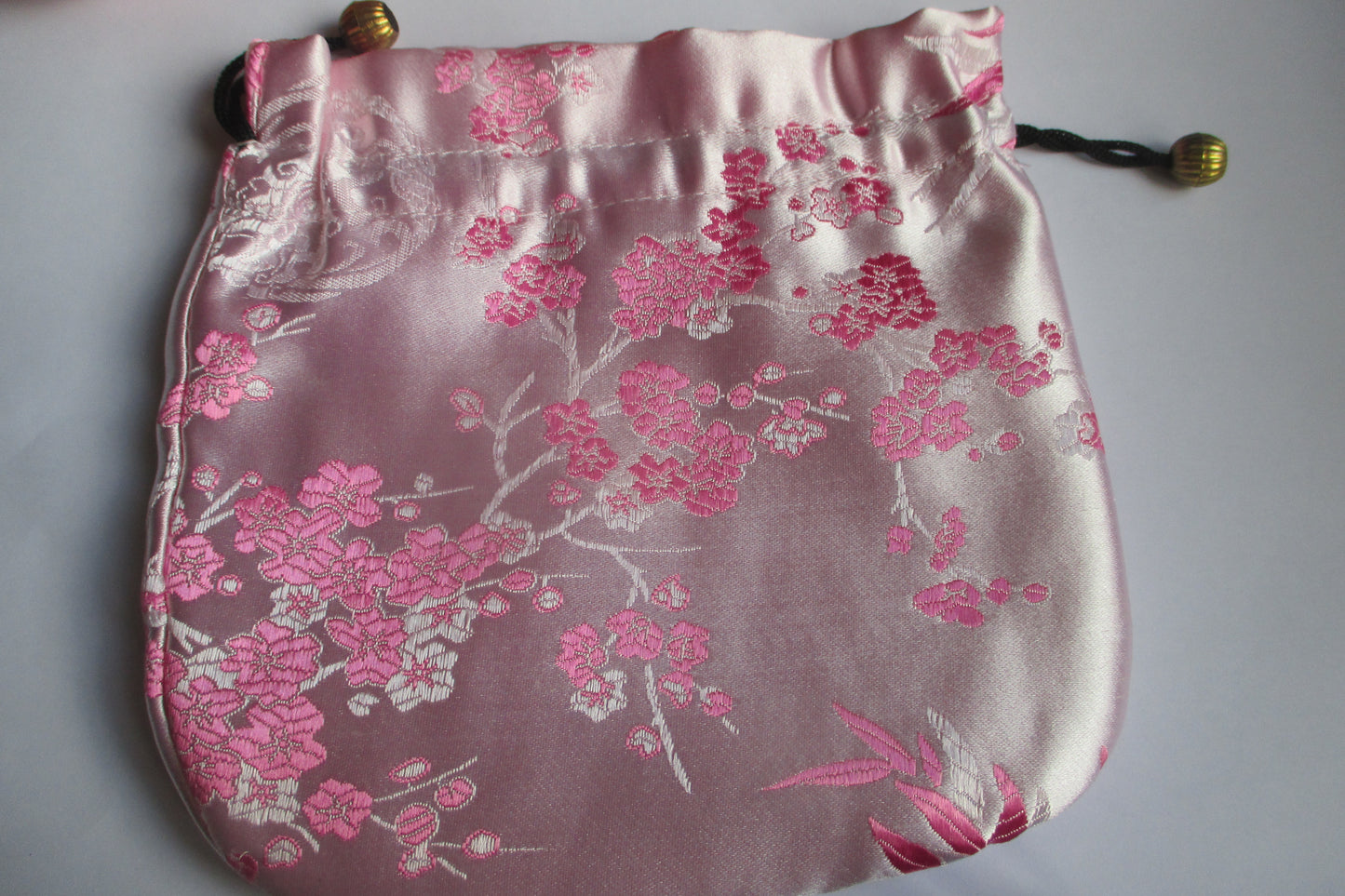 Pink silk jewel bag