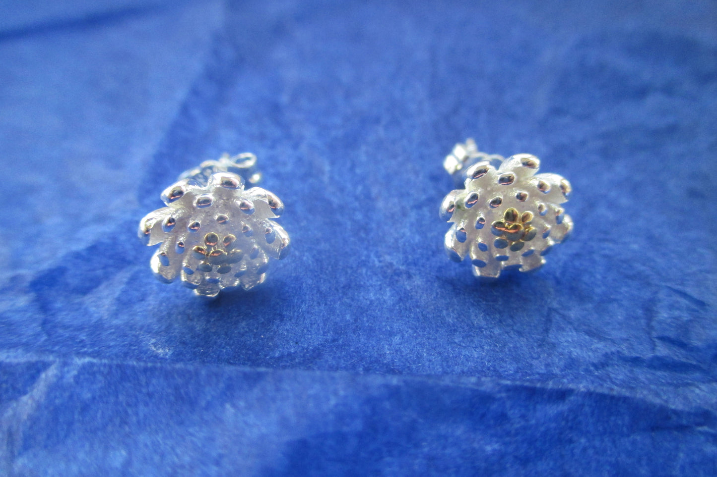 Silver flower stud earrings