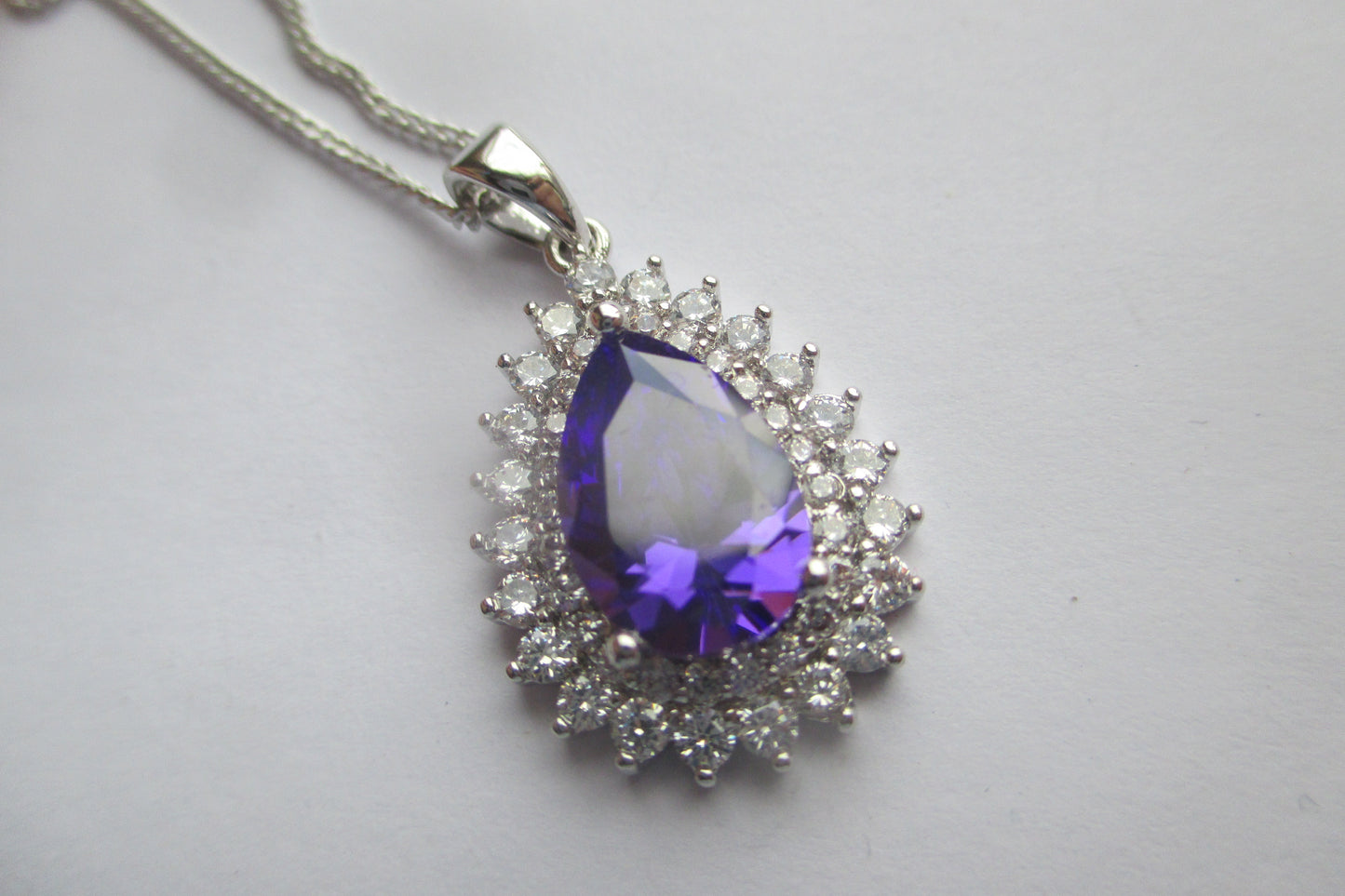 Pear violet stone silver pendant