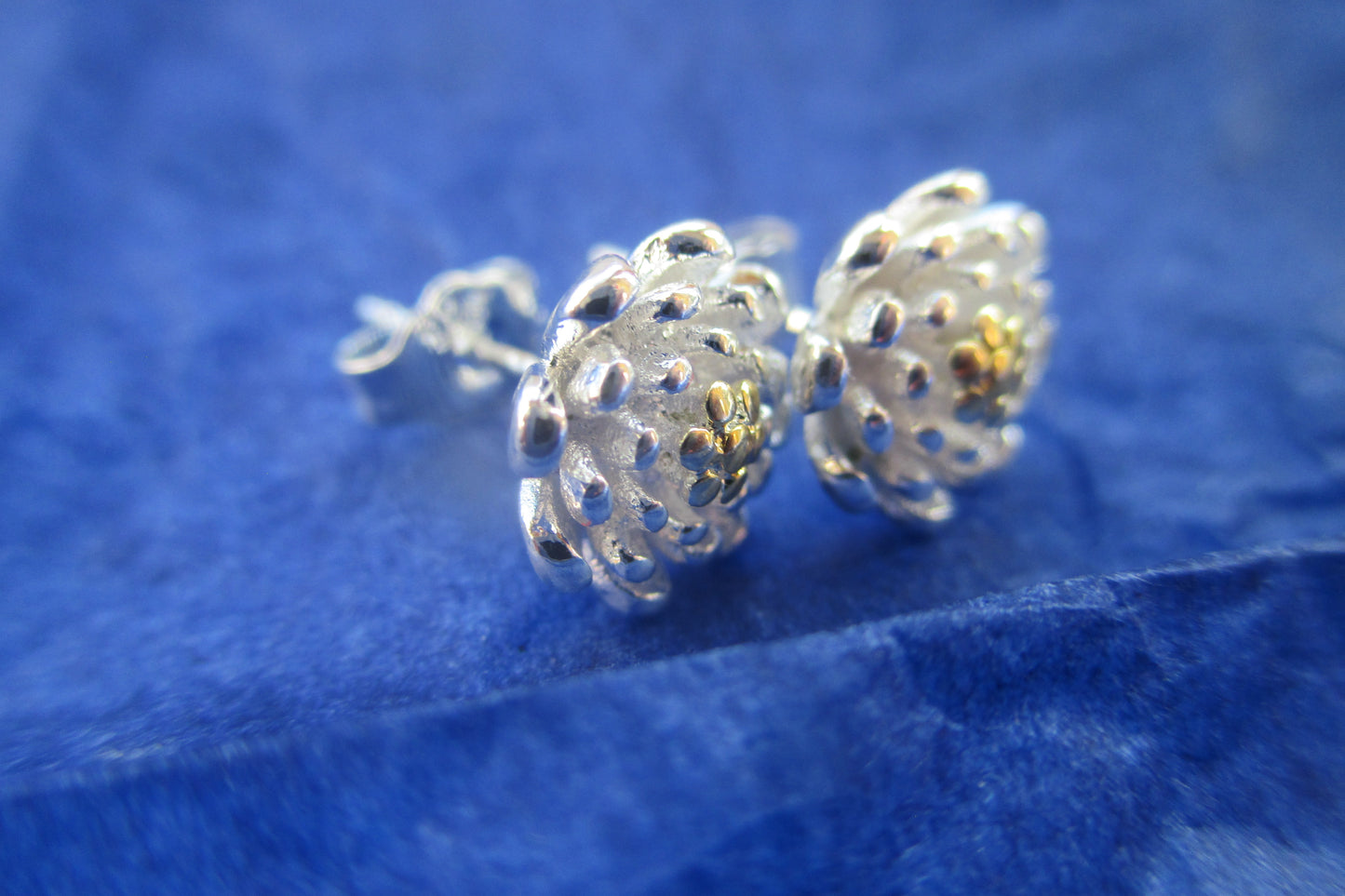 Silver flower stud earrings