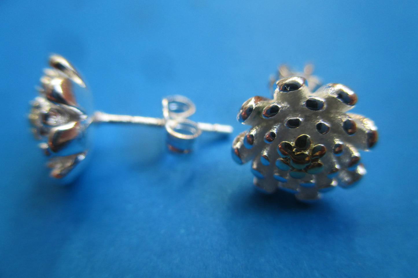 Silver flower stud earrings