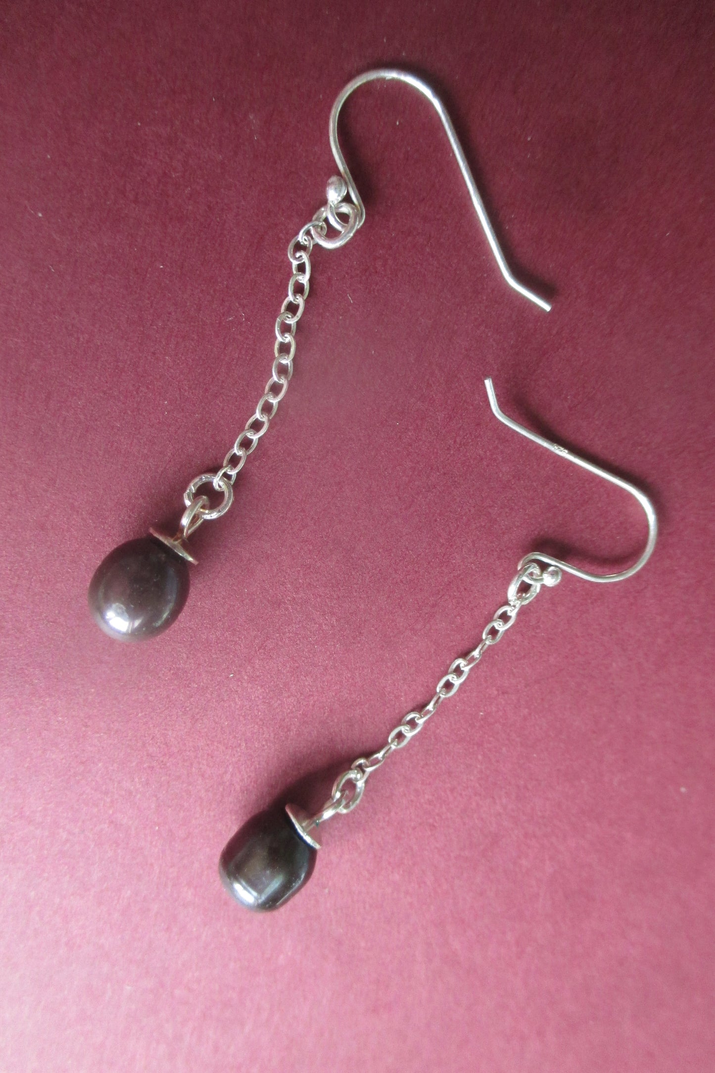 Silver hook black pearl earrings