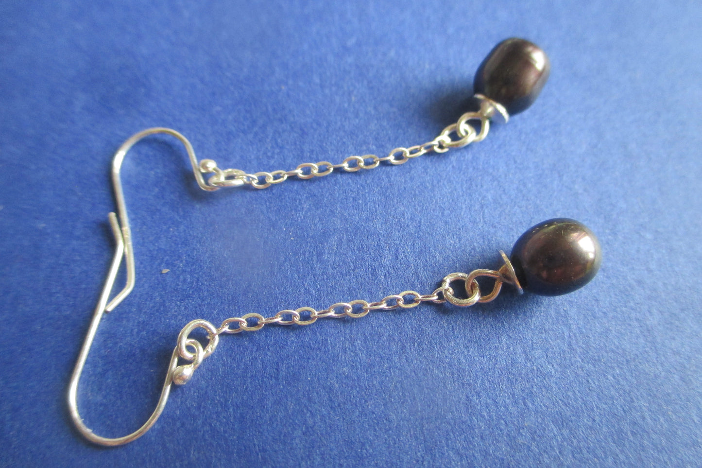 Silver hook black pearl earrings