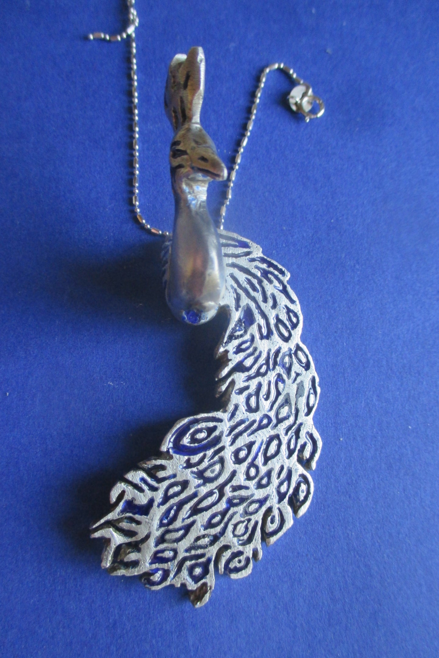 Silver peacock pendant