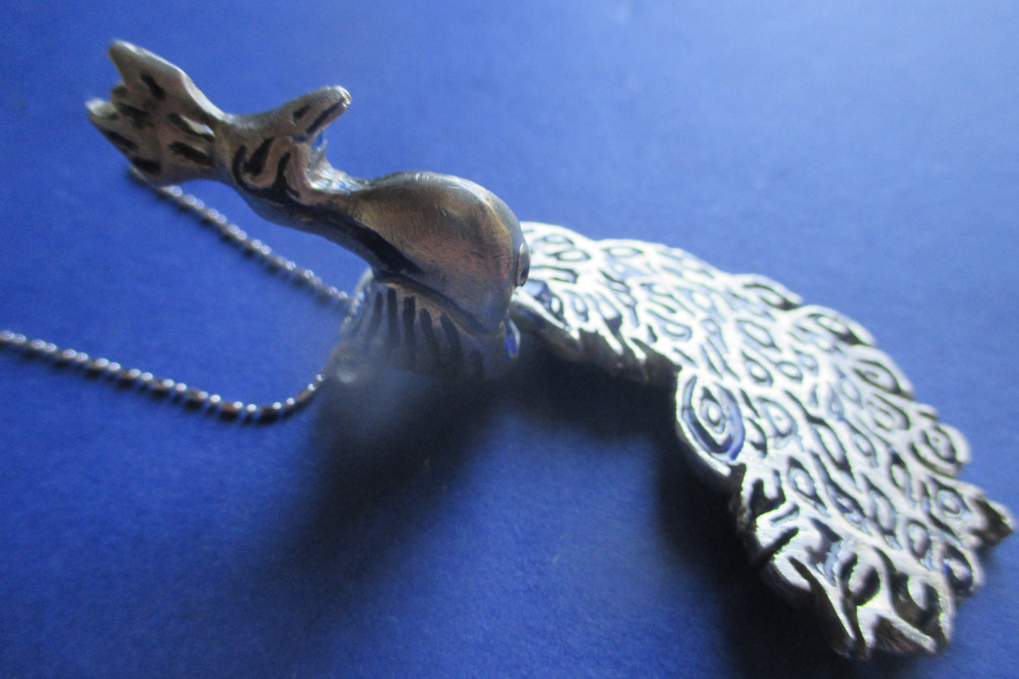 Silver peacock pendant