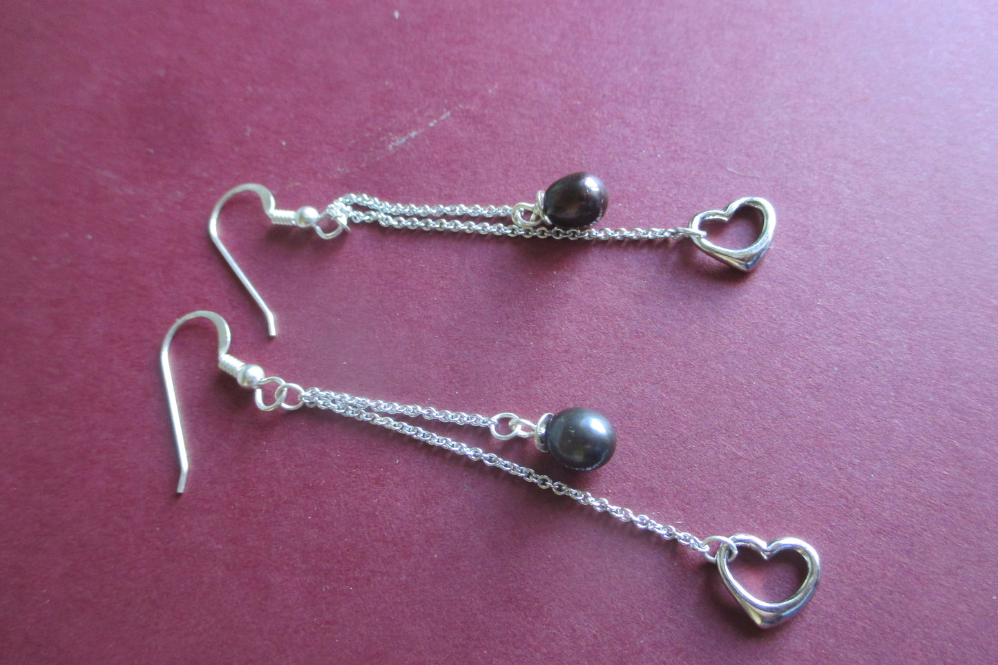 Silver hearts and black pearl hook earrings