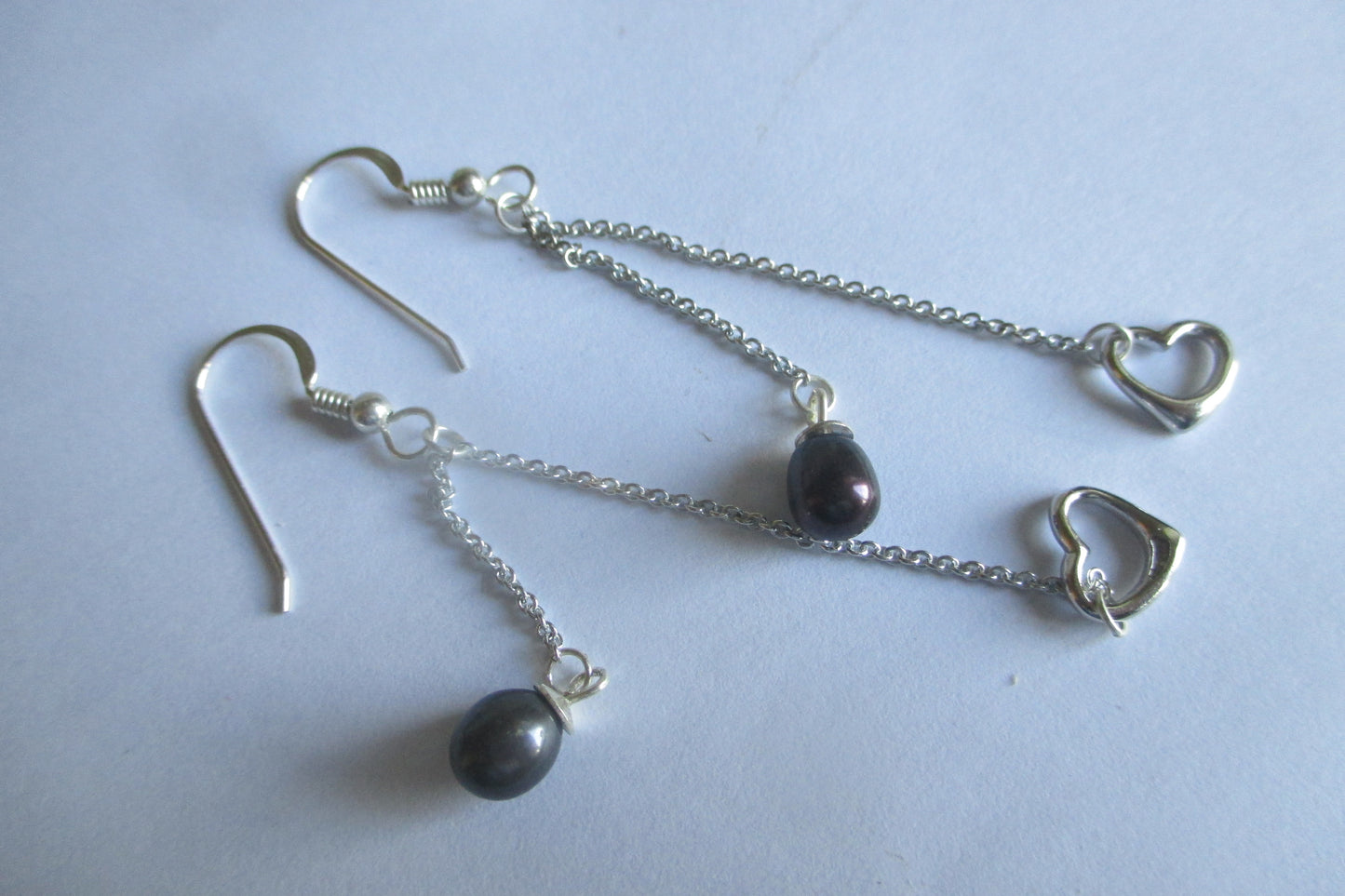 Silver hearts and black pearl hook earrings