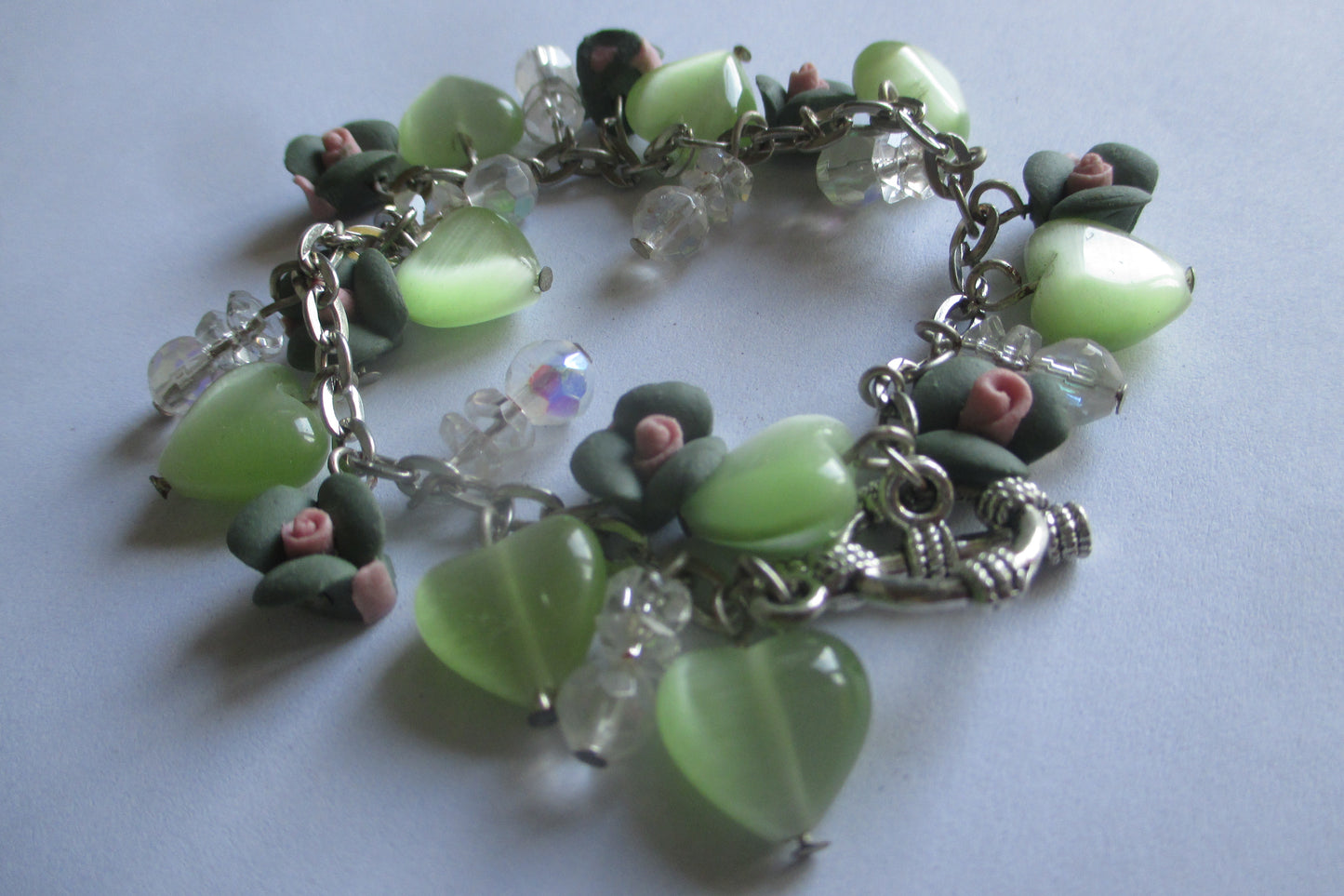 Green glass and polymer flower bracelet