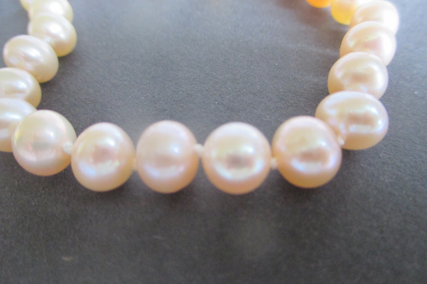 Pink pearl bracelet with gold clasp