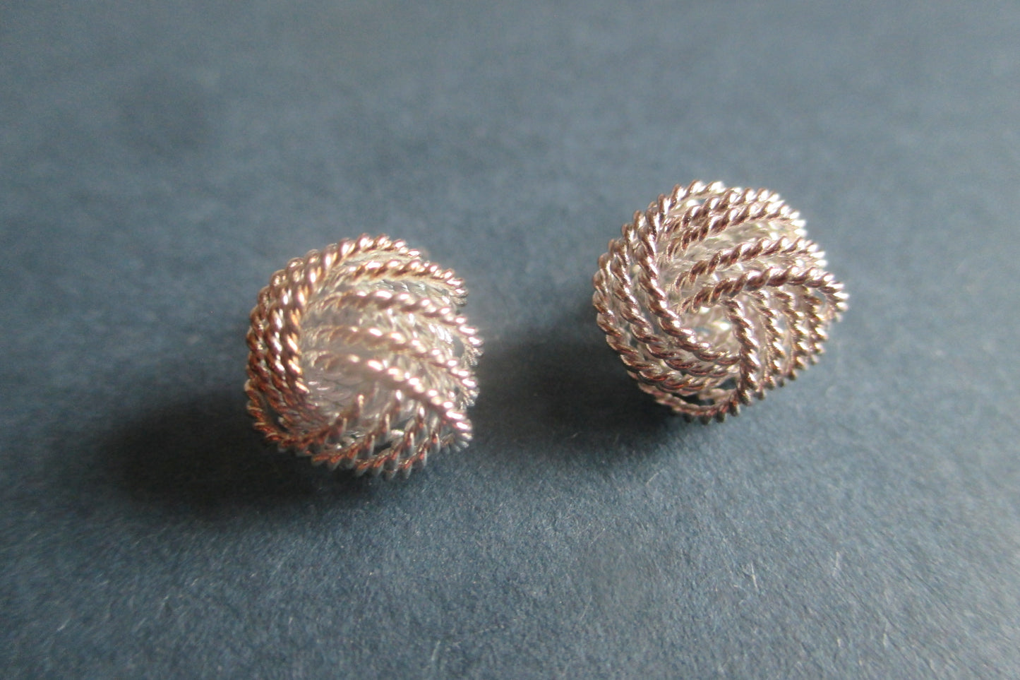 Silver tied knott stud earrings