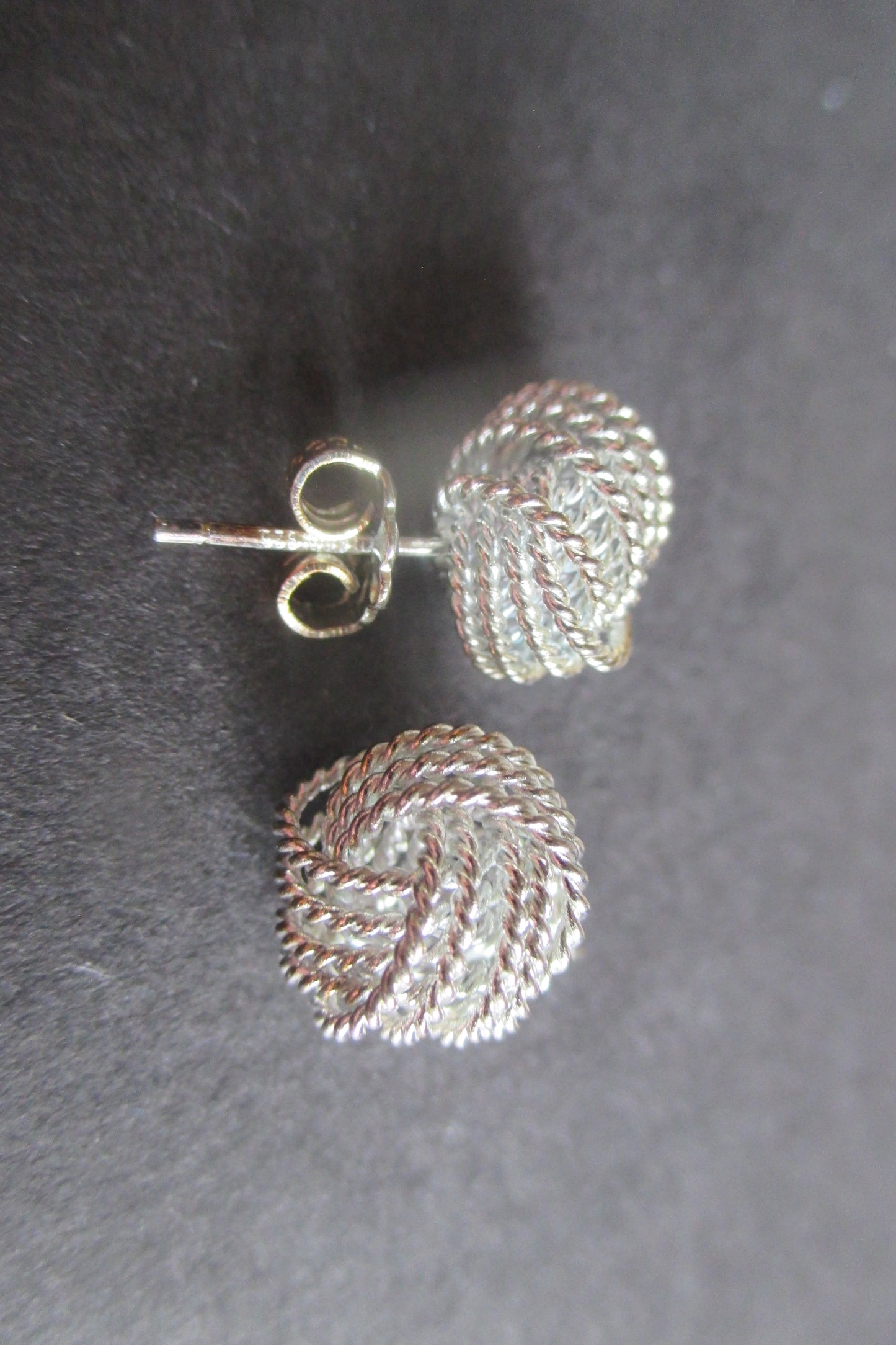 Silver tied knott stud earrings