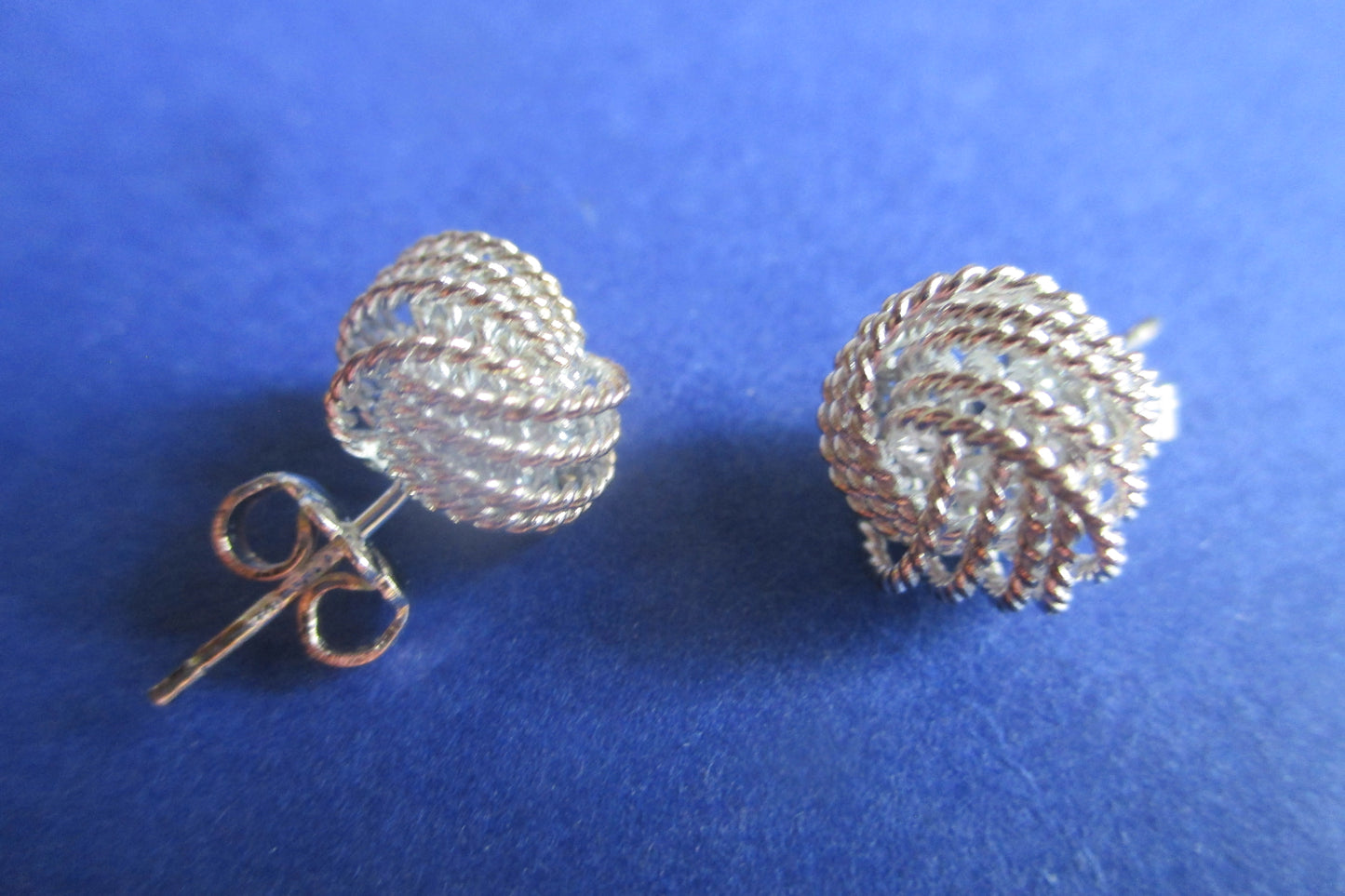 Silver tied knott stud earrings