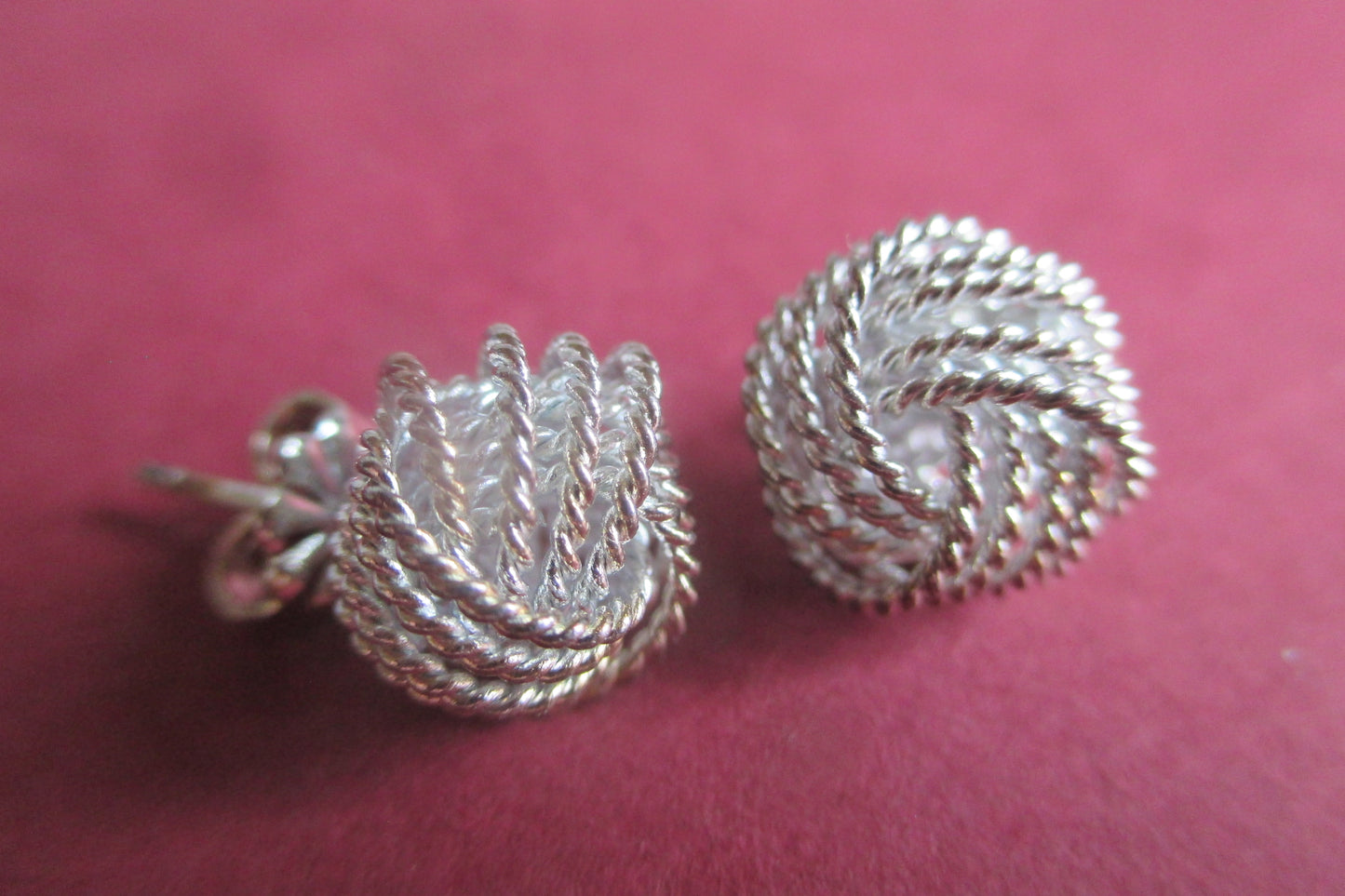 Silver tied knott stud earrings