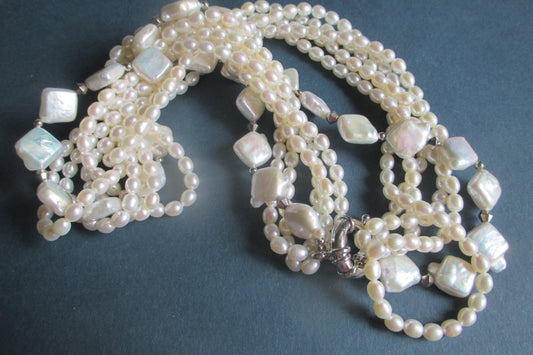 Eliptical 6mm freshwater pearl necklace ( 5 strand )