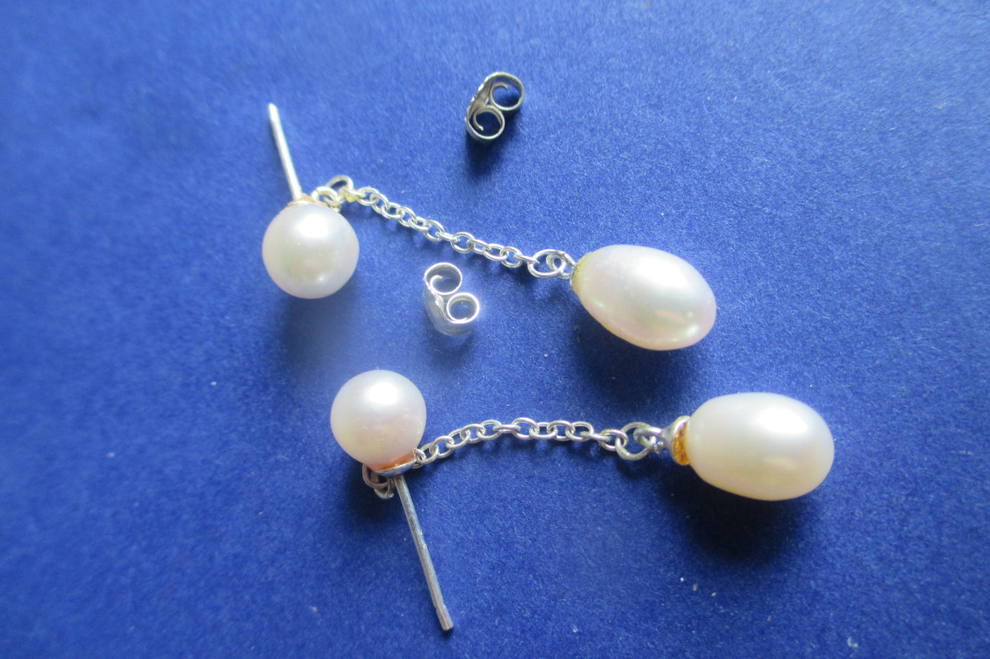 Silver pearl stud earrings