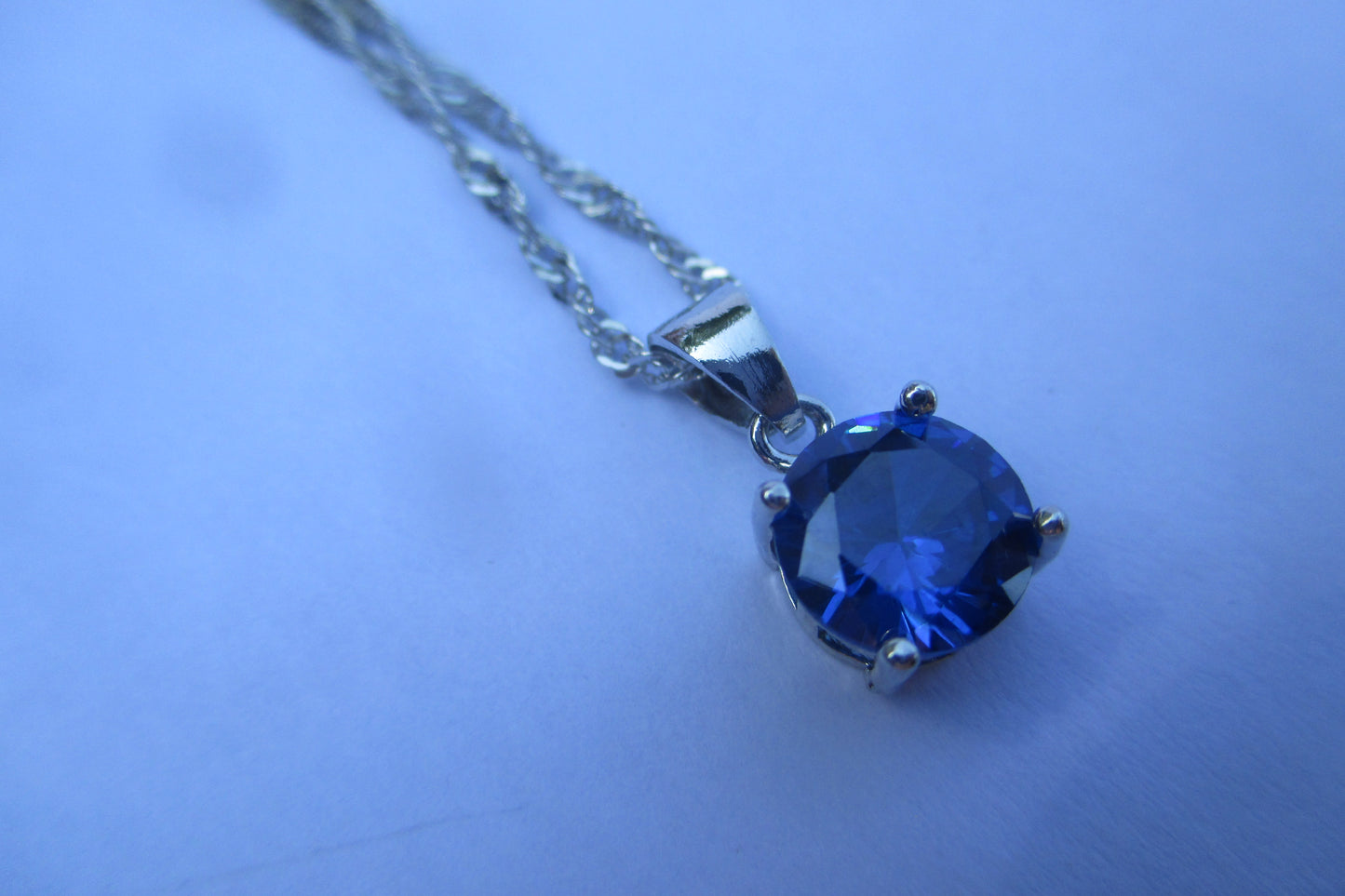 Sapphire ,( man made ) pendant