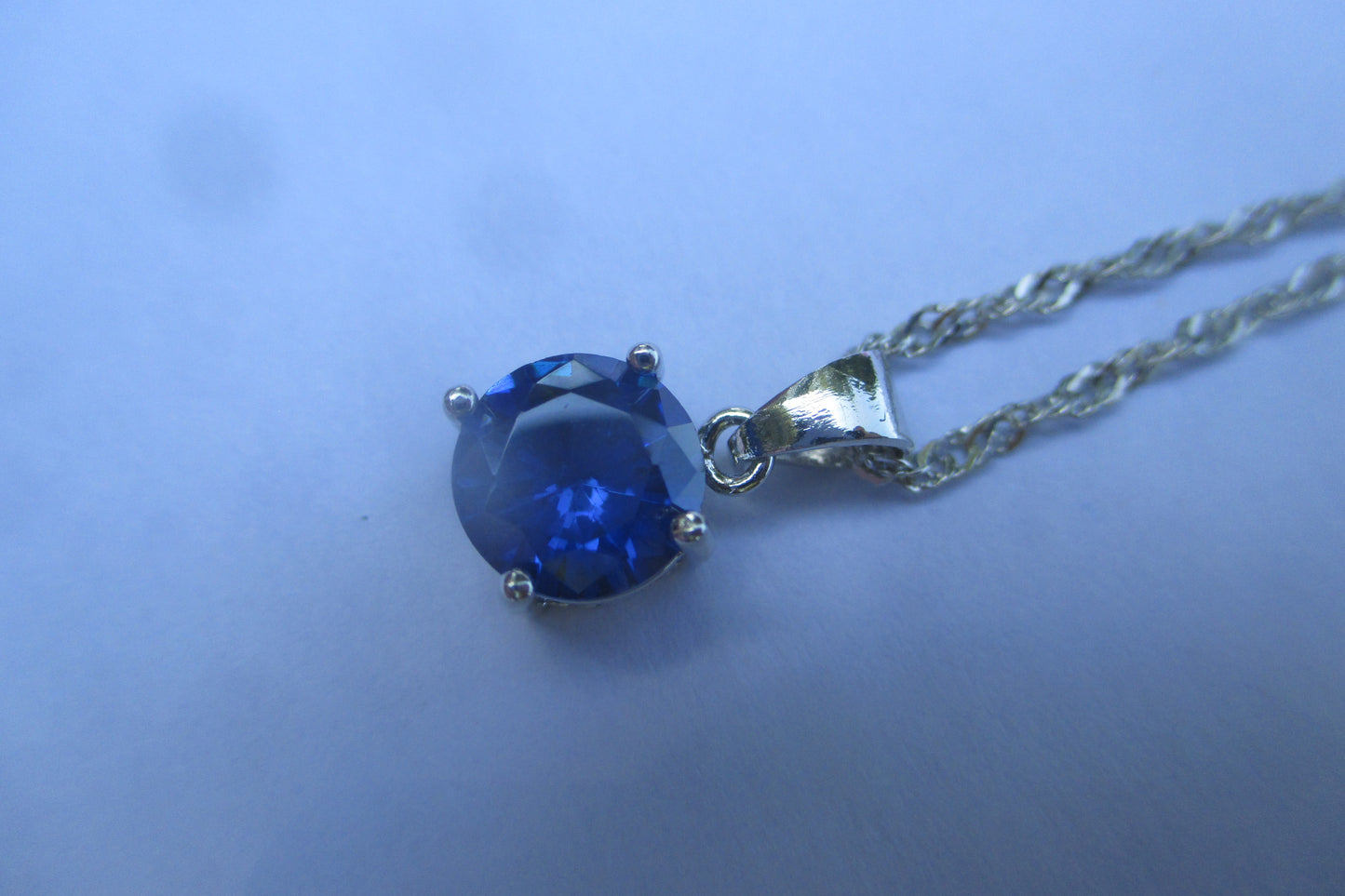 Sapphire ,( man made ) pendant