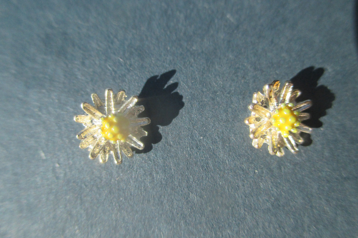 Silver flower stud earrings