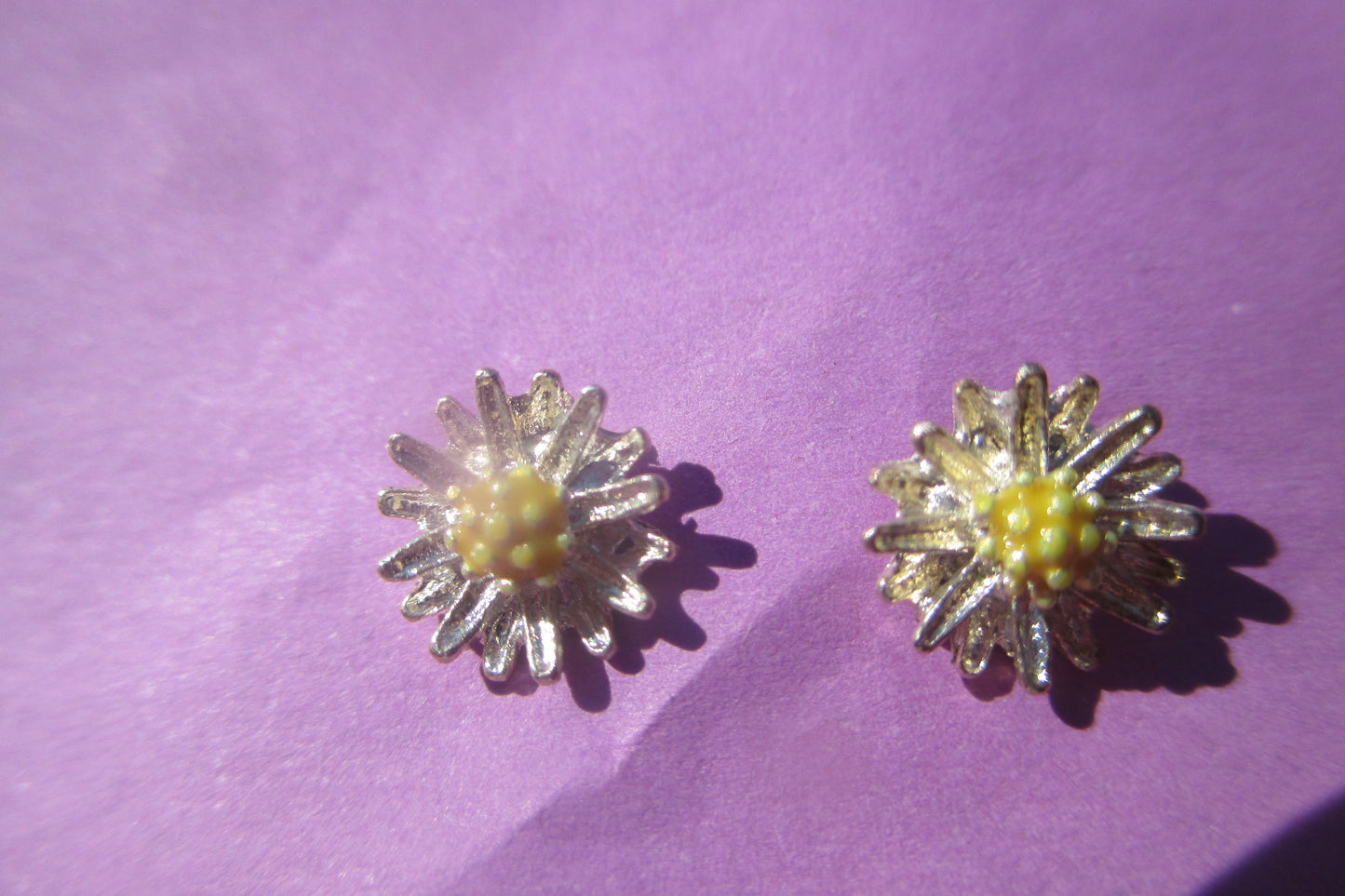 Silver flower stud earrings