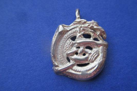 Silver dragon pendant