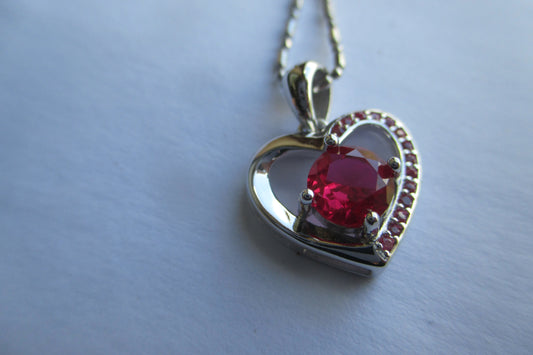 Silver heart with garnet pendant