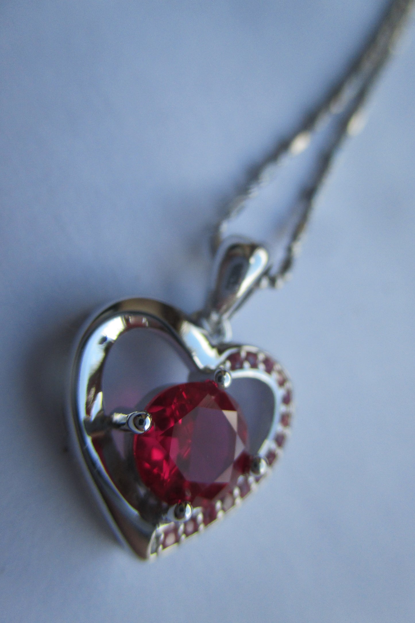 Silver heart with garnet pendant